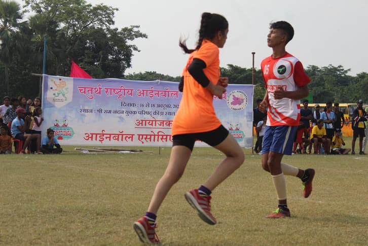 Young athletes competing at a grassroots track event
