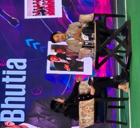 Bhaichung Bhutia on screen during a stage session