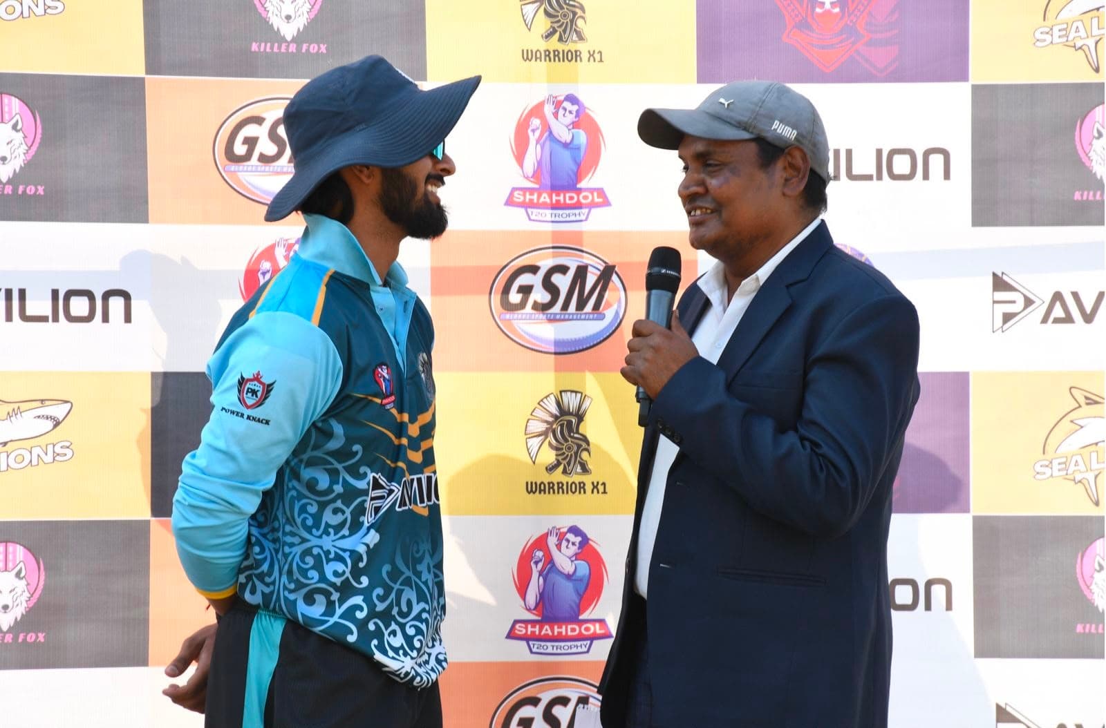 Post-match interview against the GSM branded backdrop