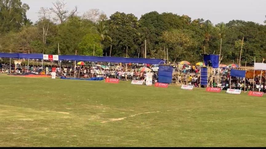 Crowd around the boundary at a district ground