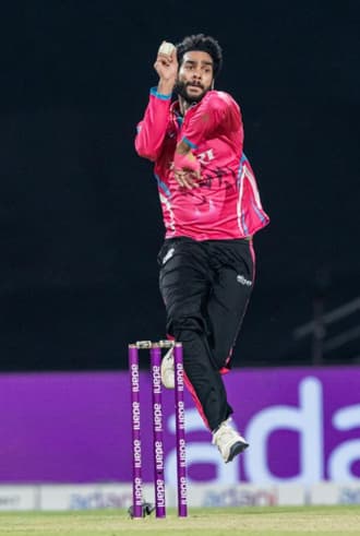 Bowler in his delivery stride during a league fixture