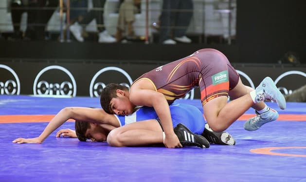 Bout in progress on the mat at the Pro Wrestling League