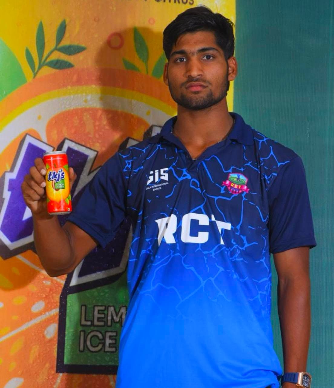 RCT player in team kit for a sponsor endorsement shot